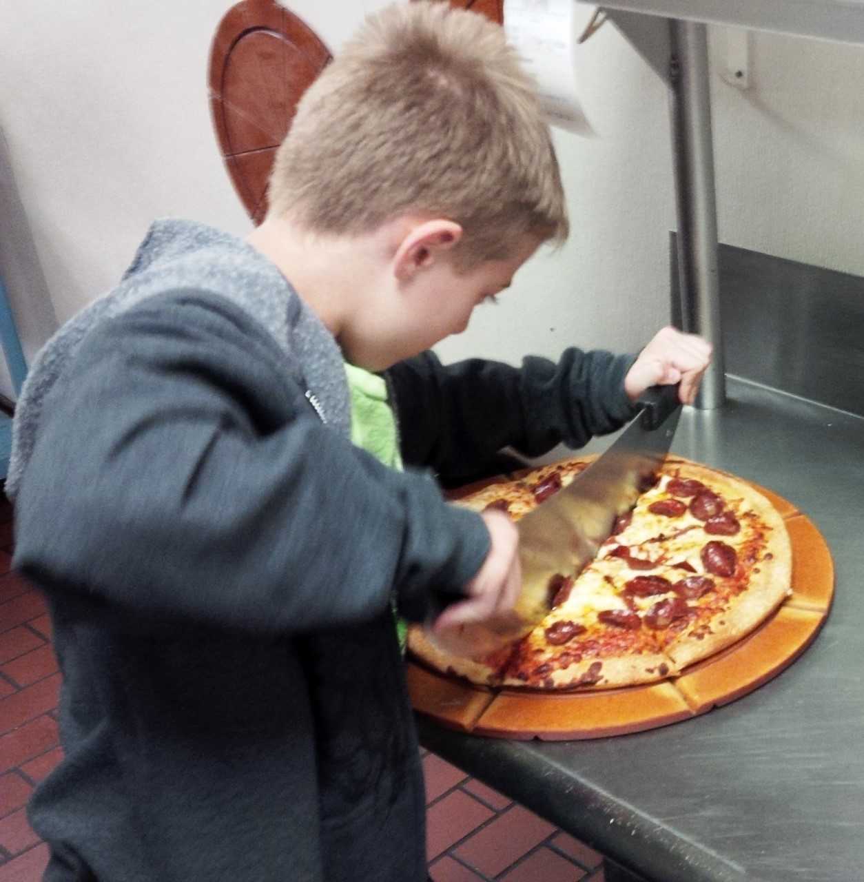 Thanks To A School In Northeast Ohio, The Easiest Way To Cut Pizzas Into Equal Slices Was Solved